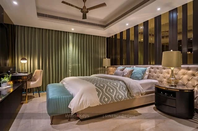 Master Bedroom with Fluted Backdrop and Teal Accents