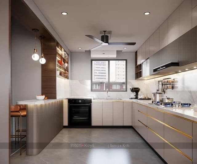 U-Shaped Kitchen with Gold Handles and Breakfast Bar