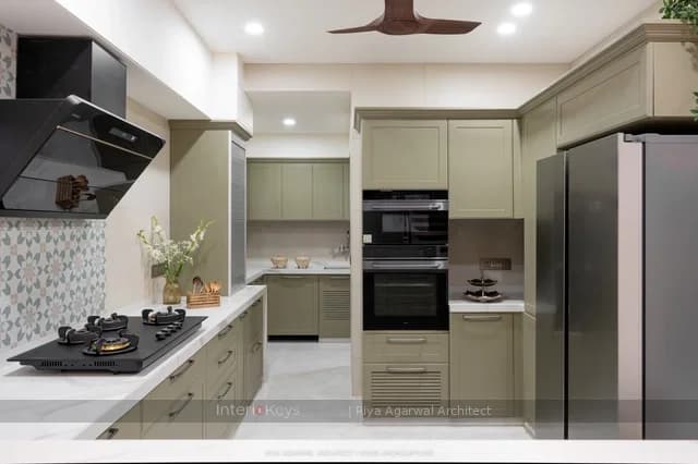 Sage Green L-Shaped Kitchen with Marble Counters