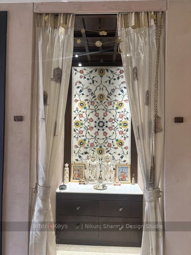 Pooja Room with Floral Stone-Inlay Marble Backdrop