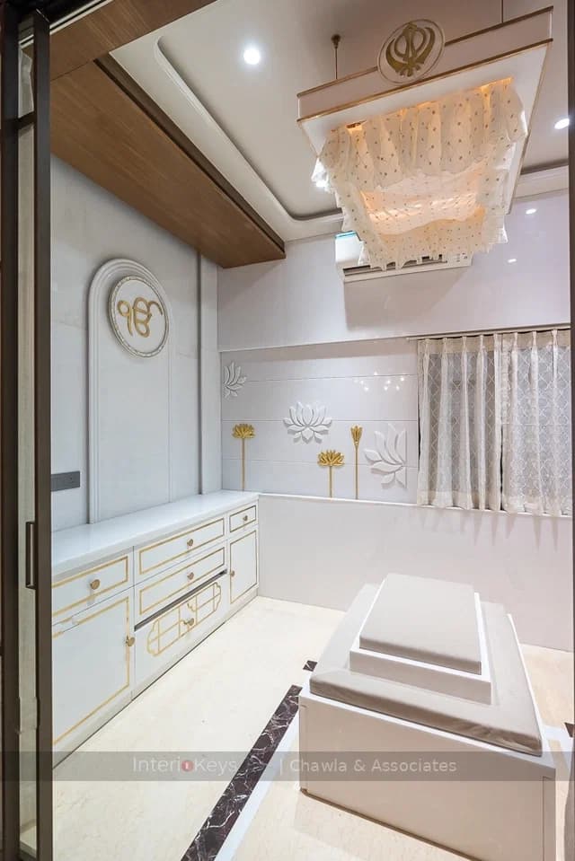 White and Gold Pooja Room with Lotus Carvings