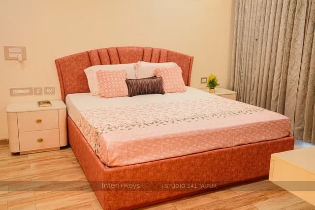 Master Bedroom with Rust Bed and Cane Wardrobes