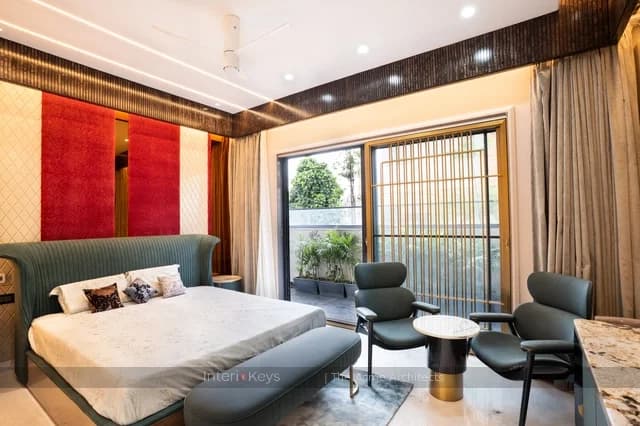 Master Bedroom with Green Tufted Bed and Balcony Window