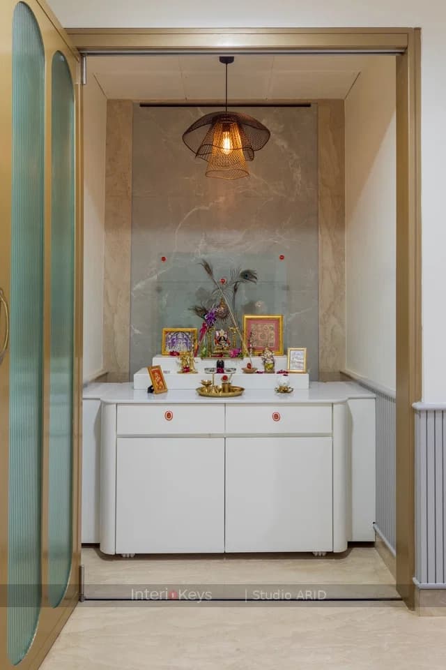 Pooja Room with White Mandir and Marble Backdrop