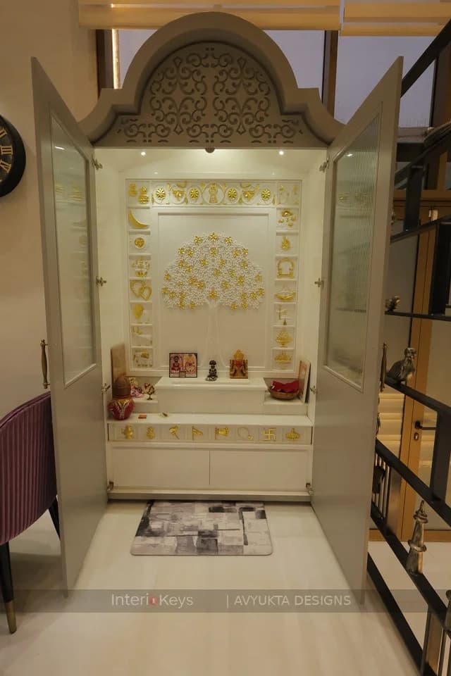 Pooja Room with a White and Gold Mandir Unit