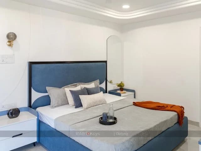 Master Bedroom with Blue Upholstered Bed