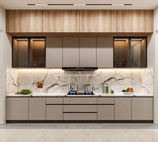 Handleless Taupe Kitchen With Marble Backsplash