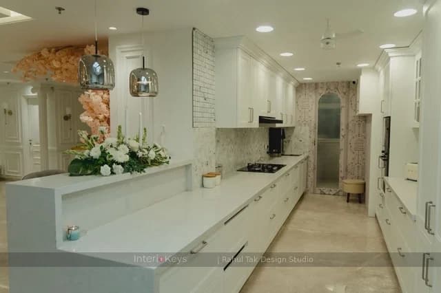 White Parallel Kitchen with Breakfast Counter