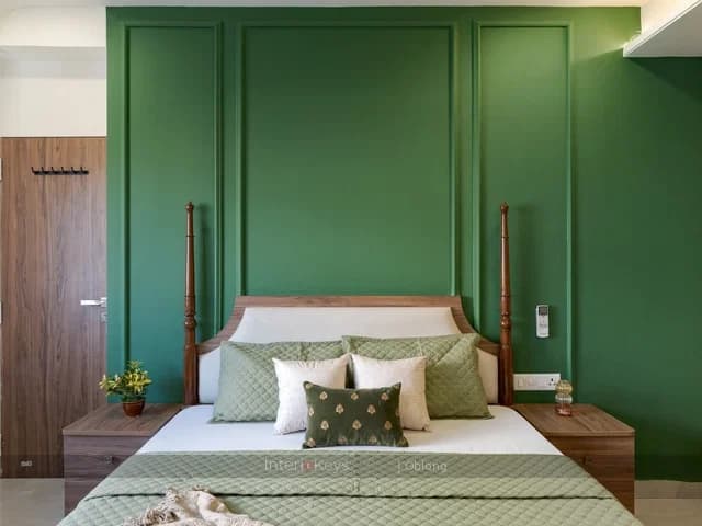 Master Bedroom with Green Panelled Wall and Wooden Bed