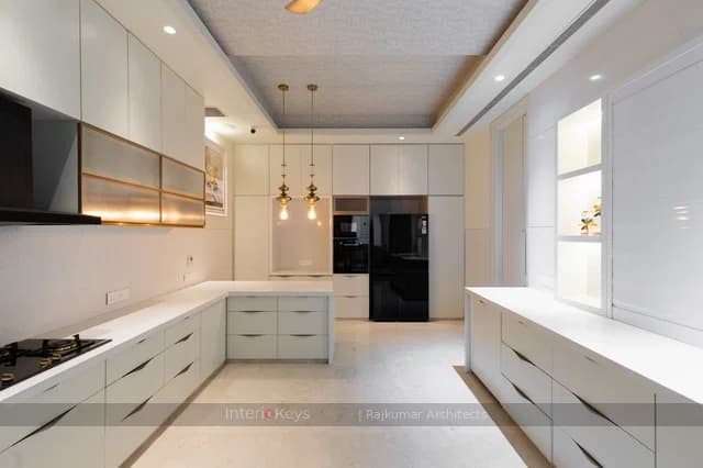 U-Shaped White Modern Kitchen with Brass Pendants