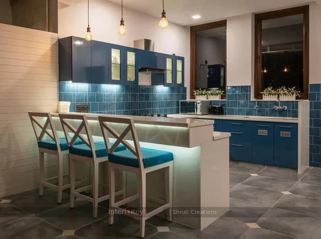 U-Shaped Blue Kitchen with Breakfast Bar