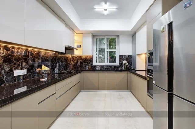 Modern U-Shaped Kitchen with Copper Marble Backsplash
