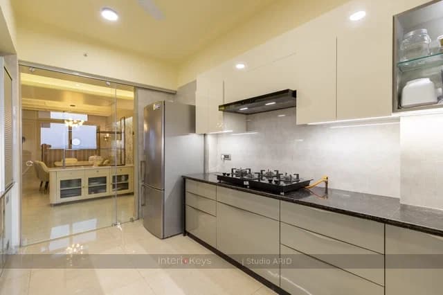 Kitchen Area with Grey Gloss Cabinets, Granite Top