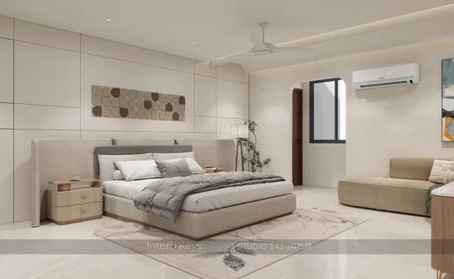 Master Bedroom With Curved Headboard and TV Wall