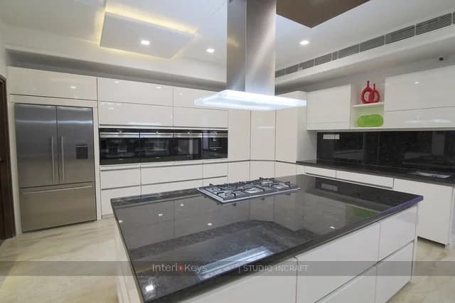 Island Kitchen with Handleless White Cabinets