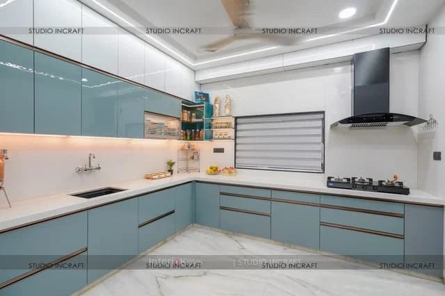 L-Shaped Kitchen with Glossy Teal Cabinets