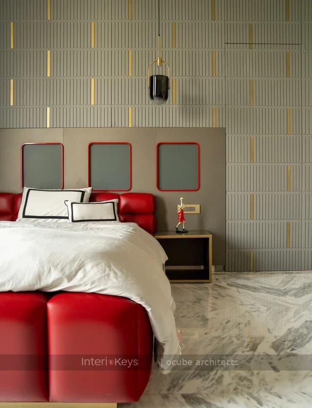 Master Bedroom with Red Leather Bed and Fluted Walls