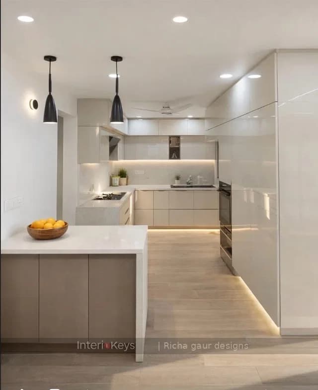 L-Shaped Kitchen with Glossy Cabinets and Peninsula