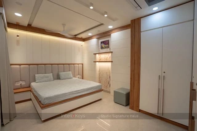 Master Bedroom with Tufted Headboard and Backlit Niche