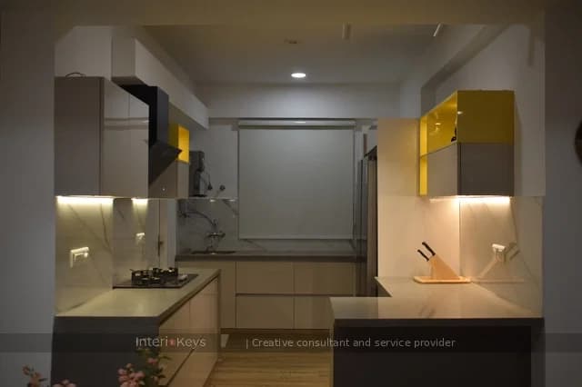 Kitchen with Glossy Grey Cabinets and Yellow Accents
